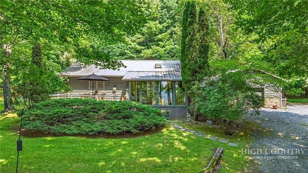 9.19 Acres of Land with Home for Sale in Todd, North Carolina
