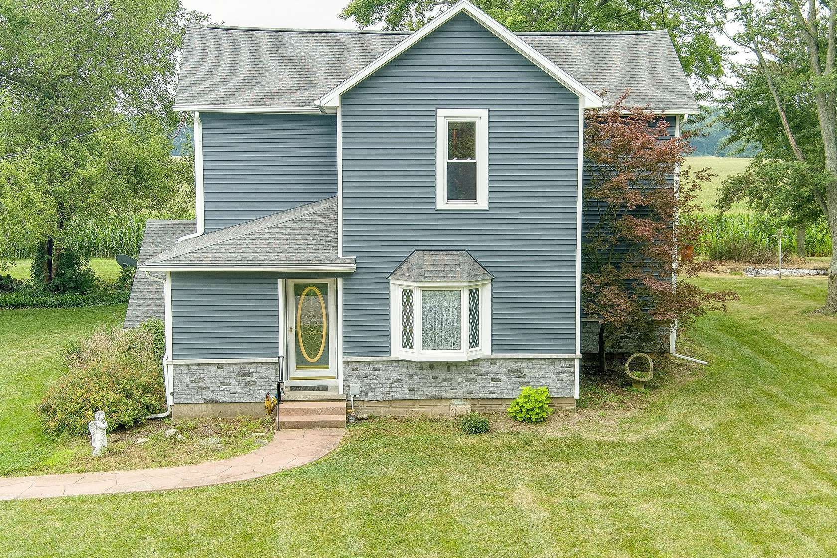 4.1 Acres of Land with Home for Sale in Jackson Center, Ohio