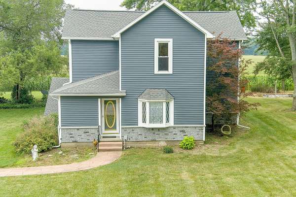 4.1 Acres of Land with Home for Sale in Jackson Center, Ohio