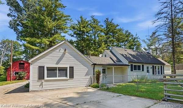 2 Acres of Land with Home for Sale in Columbus Township, Michigan