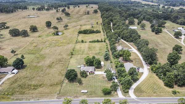 4.9 Acres of Land with Home for Sale in West Plains, Missouri