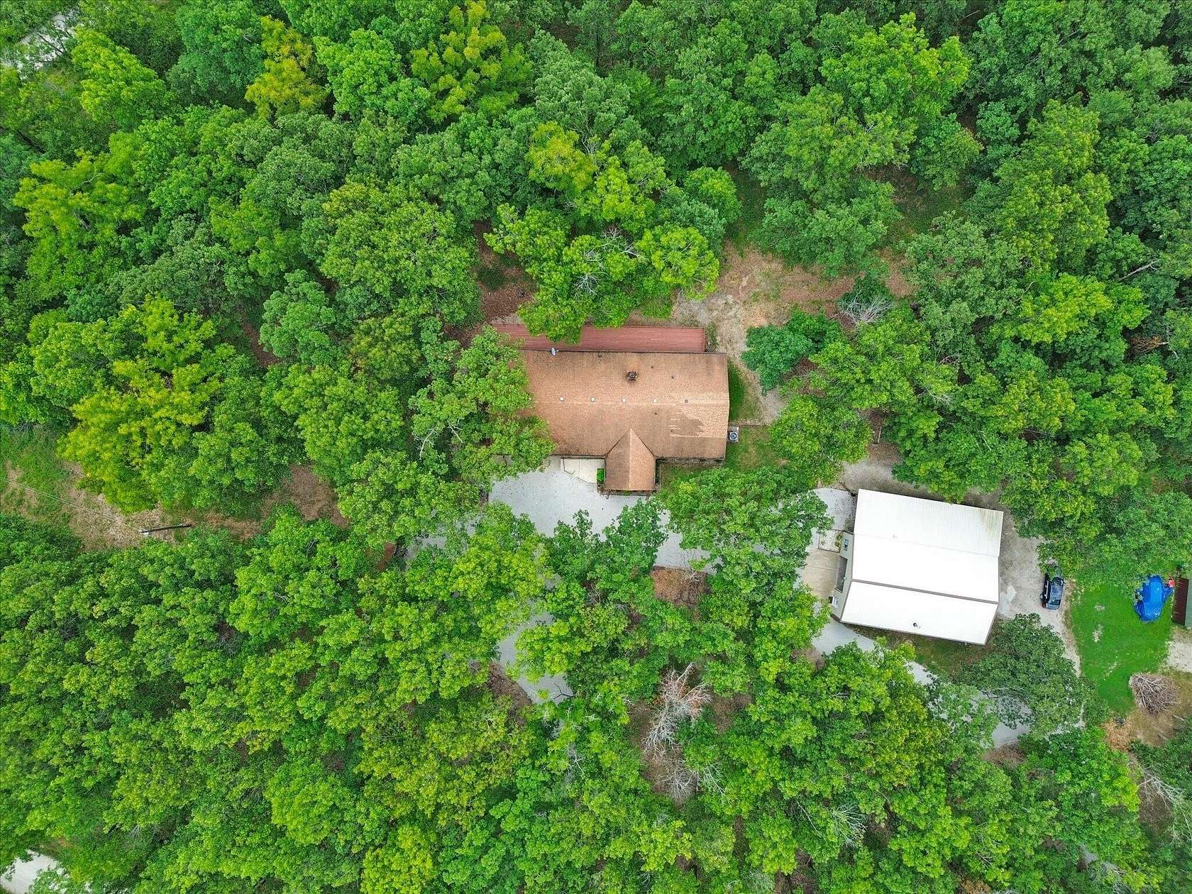 9.48 Acres of Land with Home for Sale in Pleasant Hope, Missouri