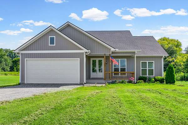 1.79 Acres of Land with Home for Sale in Adams, Tennessee