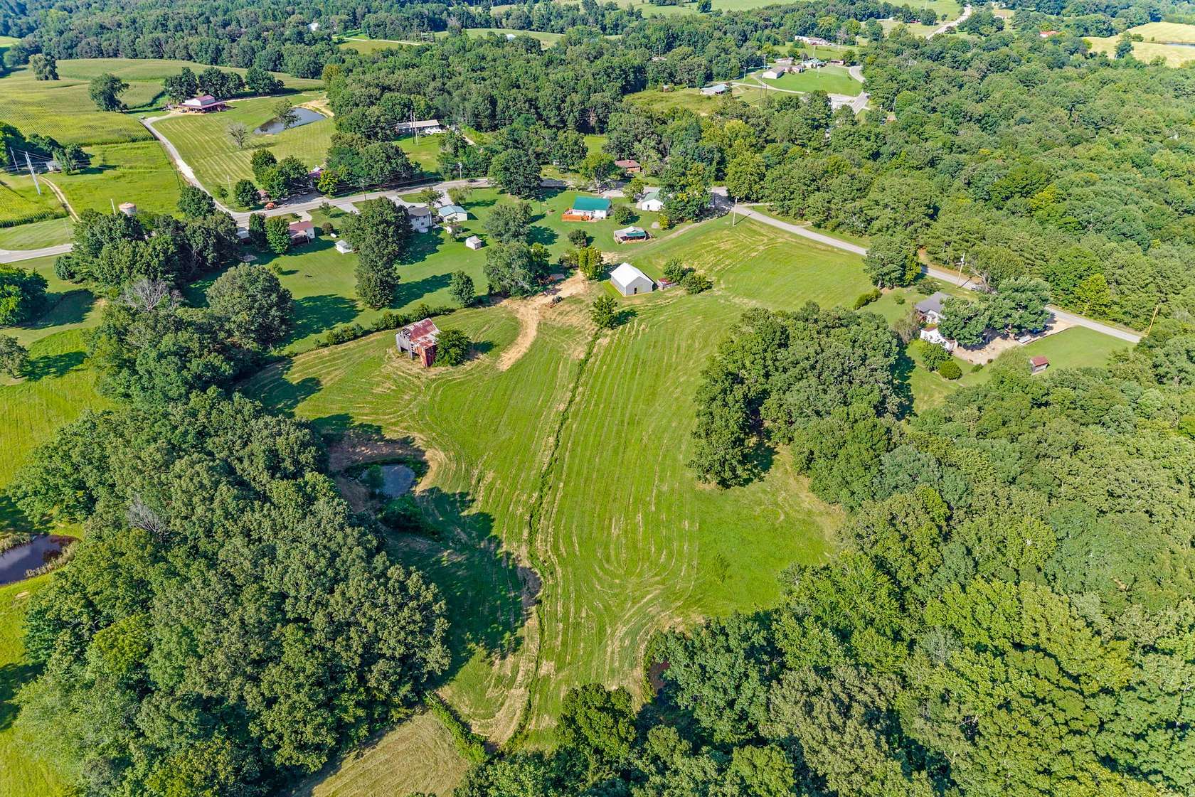 6.47 Acres of Land with Home for Sale in Big Rock, Tennessee
