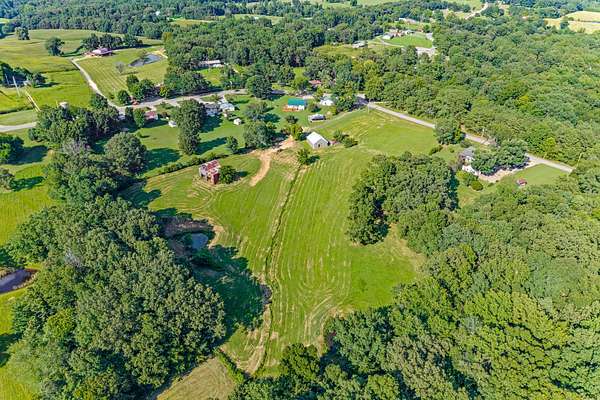 6.47 Acres of Land with Home for Sale in Big Rock, Tennessee