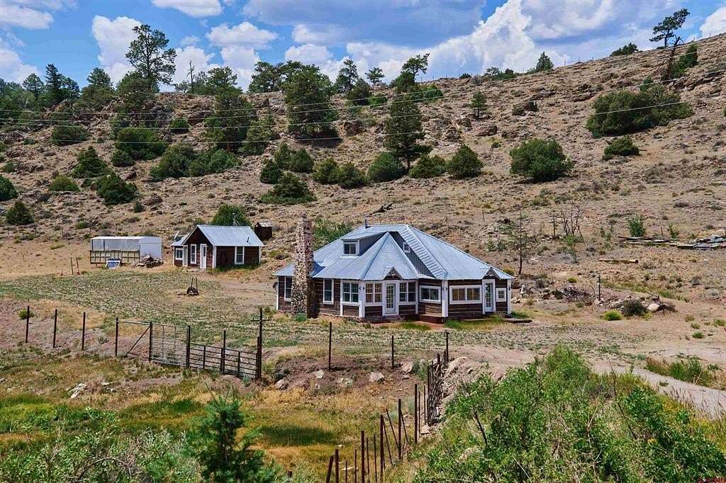 88.1 Acres of Land with Home for Sale in Powderhorn, Colorado