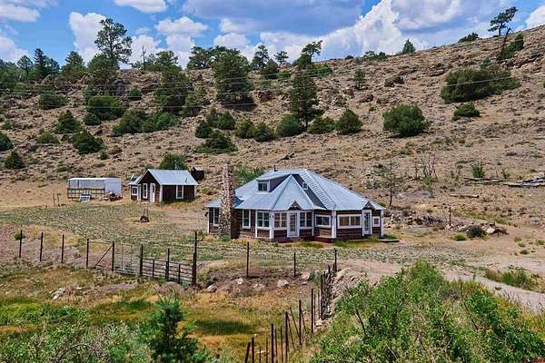 88.1 Acres of Land with Home for Sale in Powderhorn, Colorado