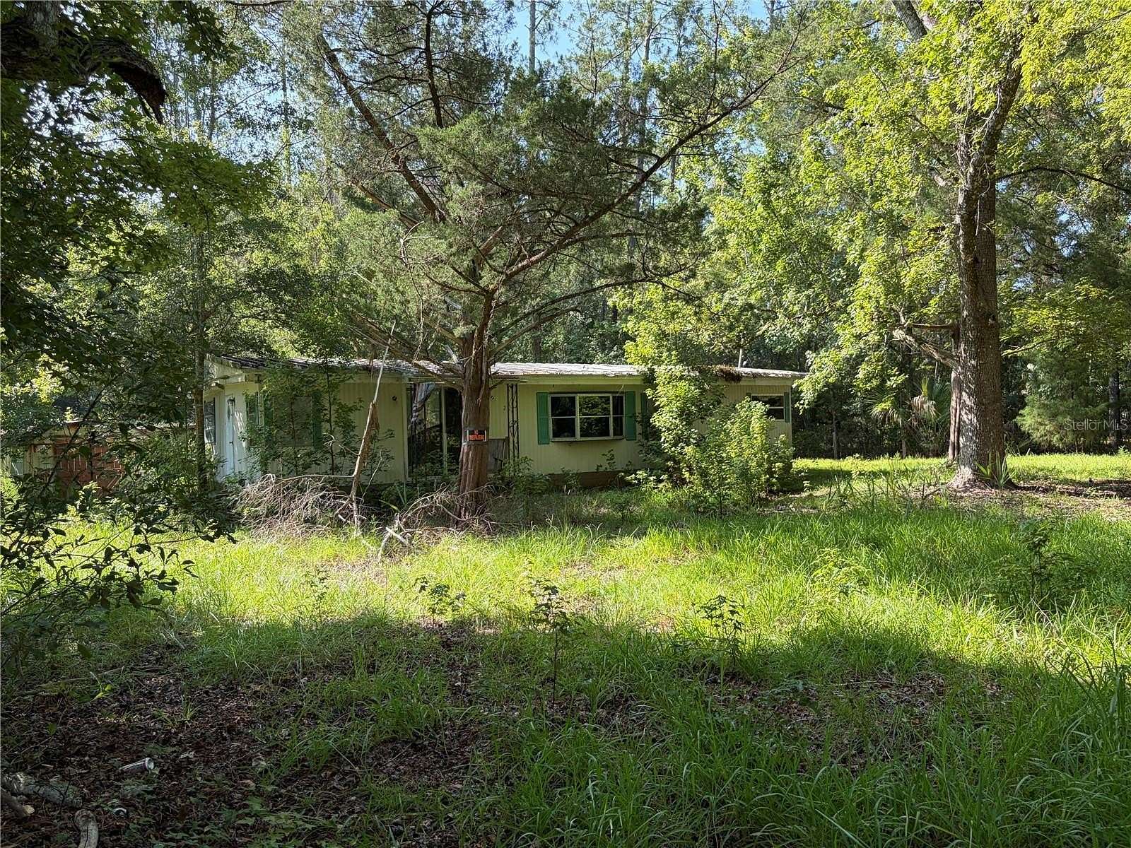 2.5 Acres of Land with Home for Sale in Silver Springs, Florida