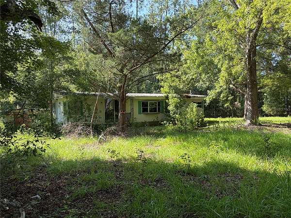 2.5 Acres of Land with Home for Sale in Silver Springs, Florida