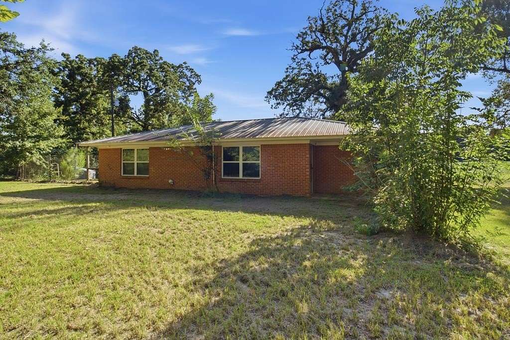 9.13 Acres of Land with Home for Sale in Nacogdoches, Texas