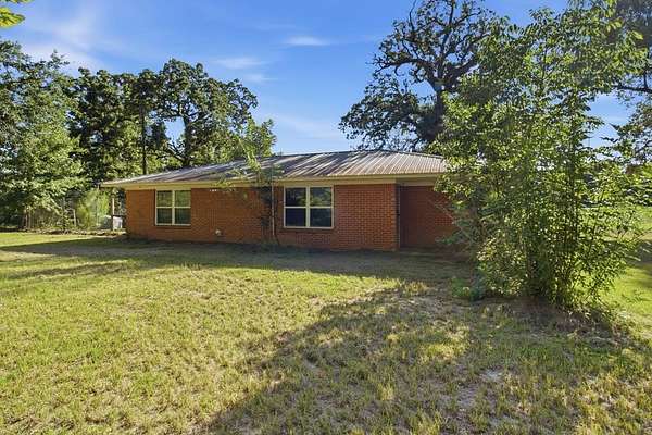 9.13 Acres of Land with Home for Sale in Nacogdoches, Texas