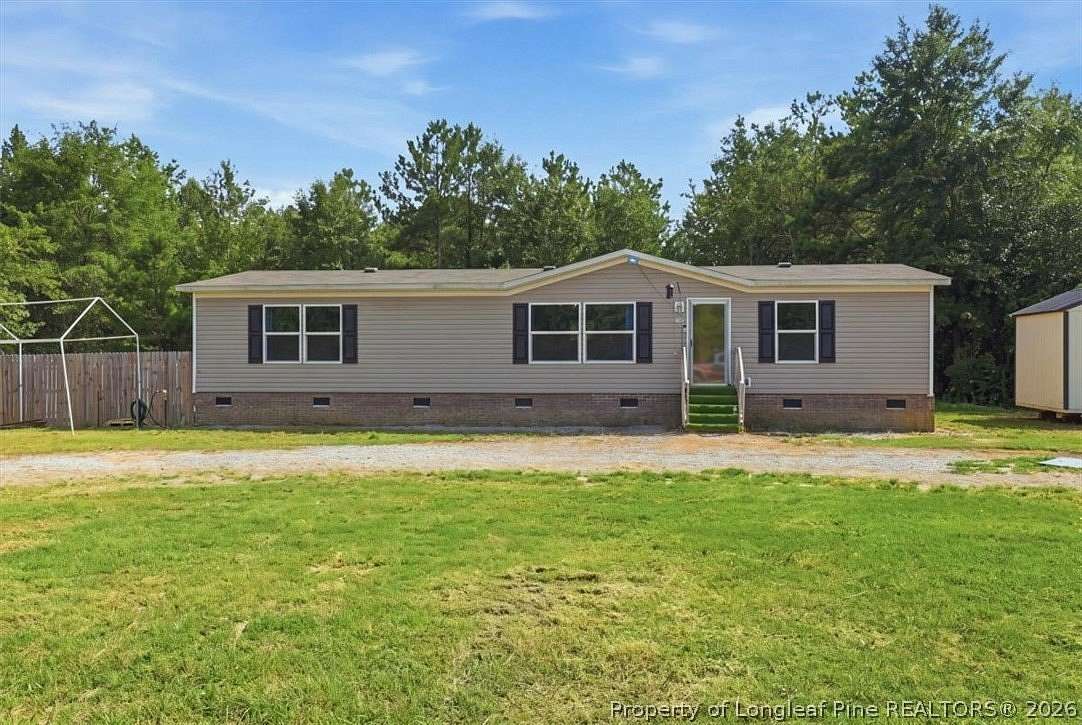 10 Acres of Land with Home for Sale in Raeford, North Carolina