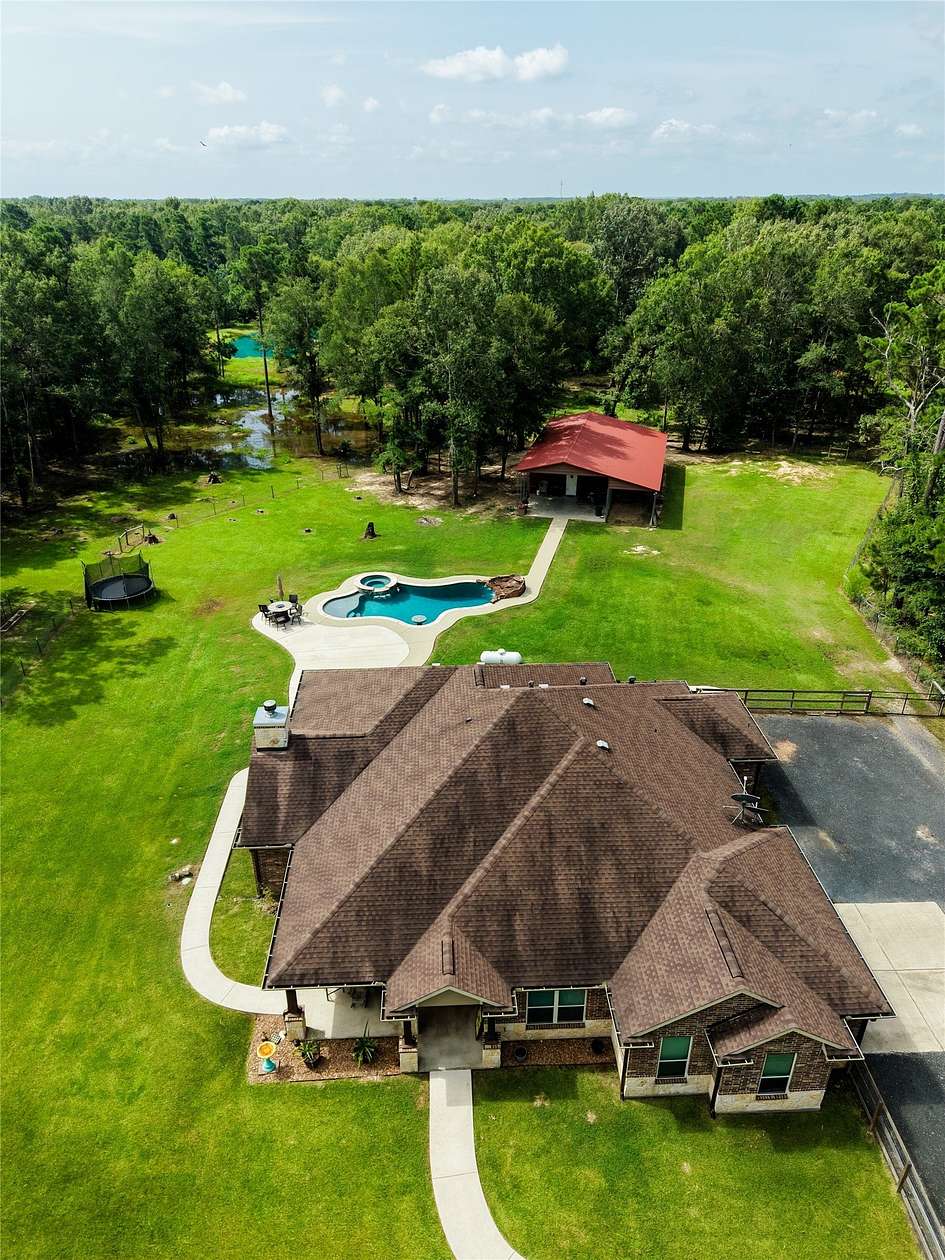 10 Acres of Recreational Land with Home for Sale in Pointblank, Texas
