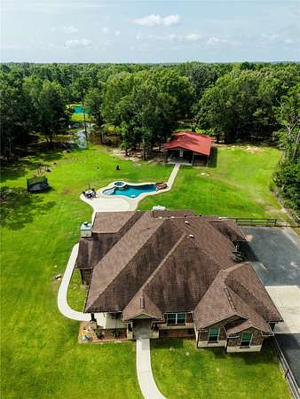 10 Acres of Recreational Land with Home for Sale in Pointblank, Texas