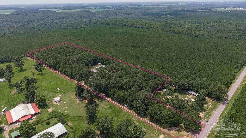 9.1 Acres of Land with Home for Sale in McDavid, Florida