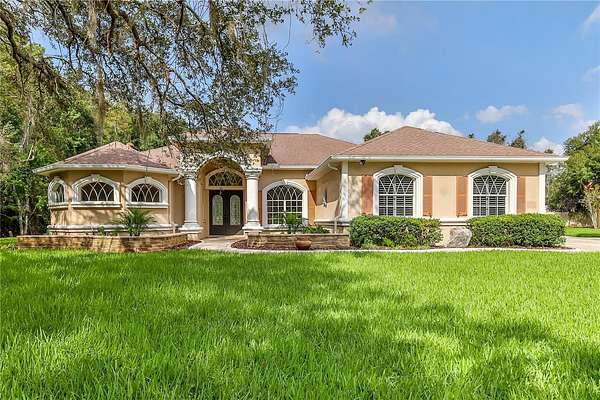 1.5 Acres of Land with Home for Sale in New Port Richey, Florida