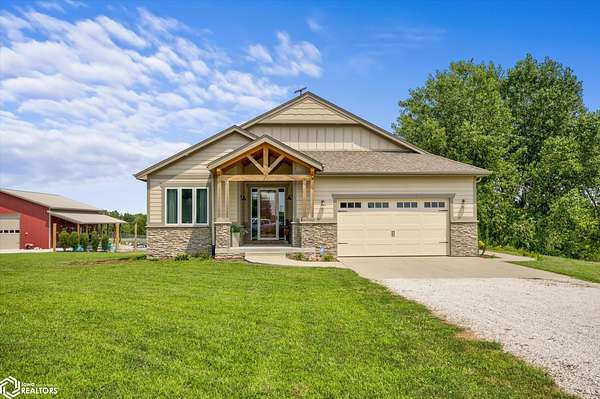 24 Acres of Recreational Land with Home for Sale in Earlham, Iowa