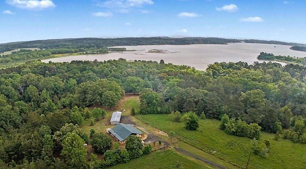 33 Acres of Recreational Land with Home for Sale in Milam, Texas