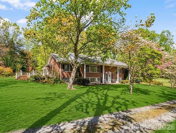 6 Acres of Land with Home for Sale in Hendersonville, North Carolina