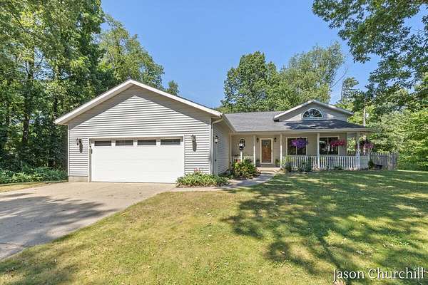 3 Acres of Land with Home for Sale in Coopersville, Michigan