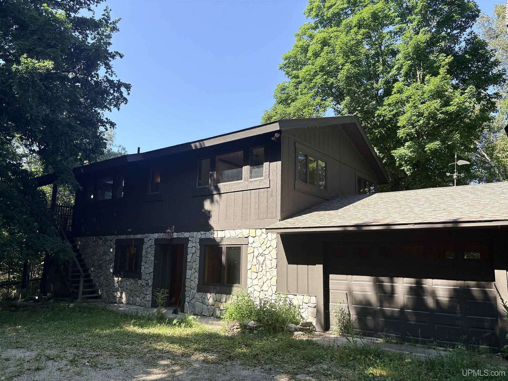 8.3 Acres of Land with Home for Sale in Garden, Michigan