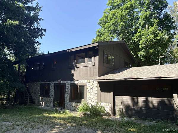 8.3 Acres of Land with Home for Sale in Garden, Michigan