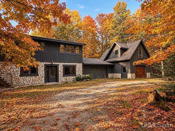 8.3 Acres of Land with Home for Sale in Garden, Michigan
