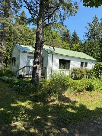 8 Acres of Land with Home for Sale in Onaway, Michigan
