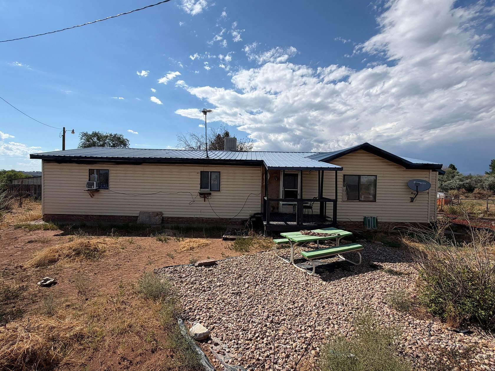 5 Acres of Land with Home for Sale in Gusher, Utah