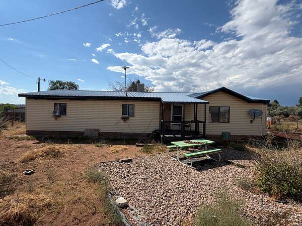 5 Acres of Land with Home for Sale in Gusher, Utah