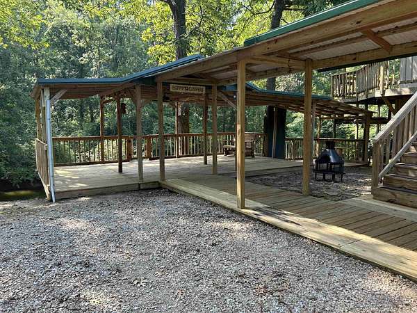 0.7 Acres of Land with Home for Sale in Adamsville, Tennessee