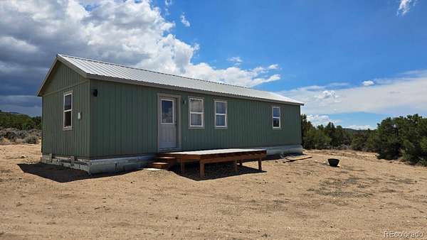 5 Acres of Land with Home for Sale in Fort Garland, Colorado
