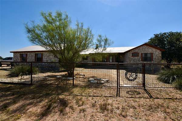 56.9 Acres of Agricultural Land with Home for Sale in Mason, Texas