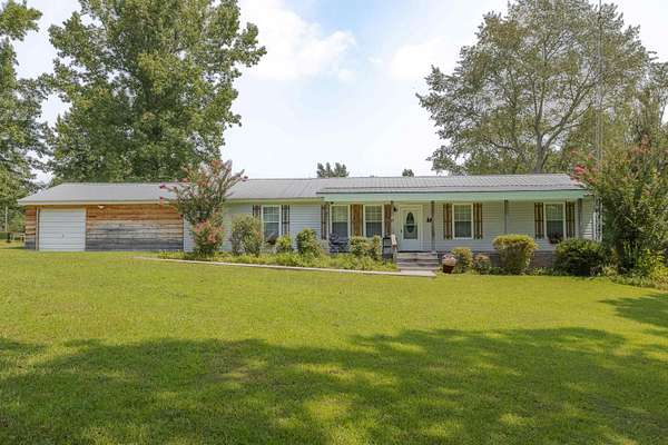9.45 Acres of Land with Home for Sale in Florence, Alabama