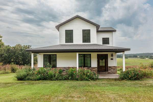 13.9 Acres of Land with Home for Sale in Niangua, Missouri