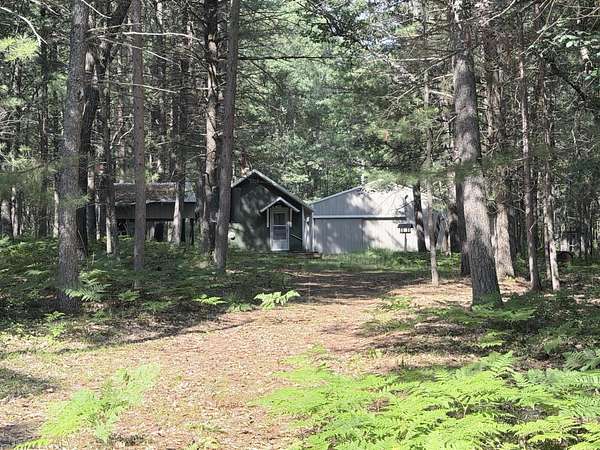 5 Acres of Land with Home for Sale in Roscommon, Michigan