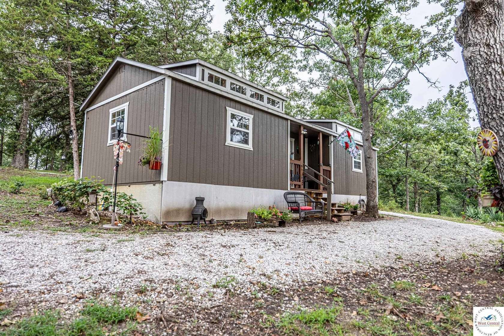 8.2 Acres of Land with Home for Sale in Warsaw, Missouri