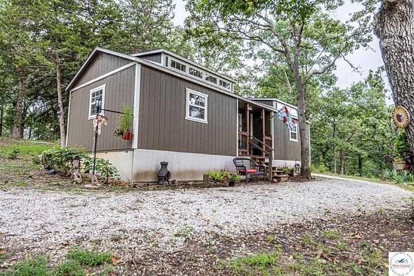 8.2 Acres of Land with Home for Sale in Warsaw, Missouri