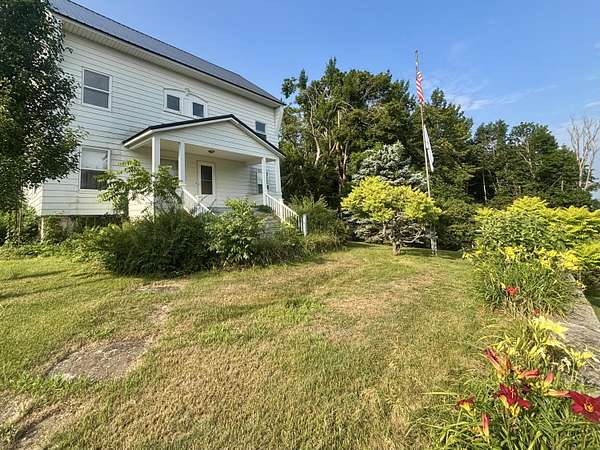 2 Acres of Land with Home for Sale in Onaway, Michigan