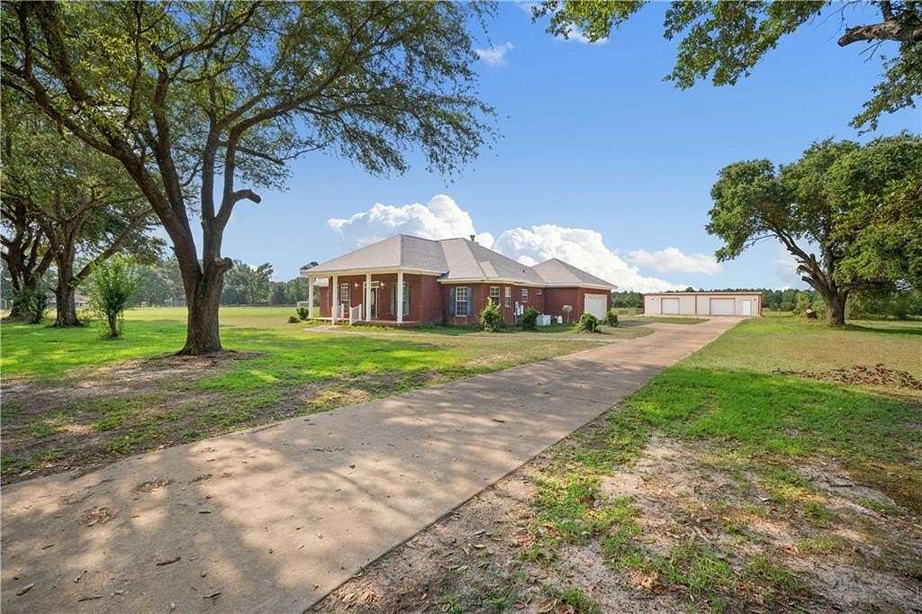 1.78 Acres of Land with Home for Sale in Wilmer, Alabama