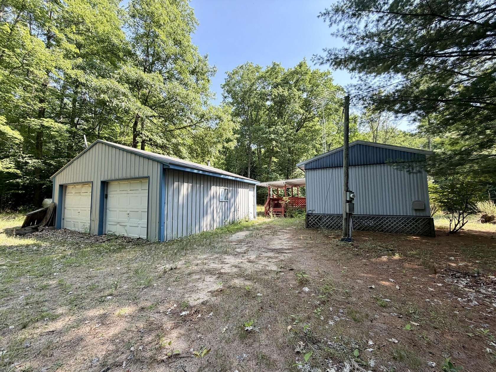 5.78 Acres of Land with Home for Sale in Brethren, Michigan