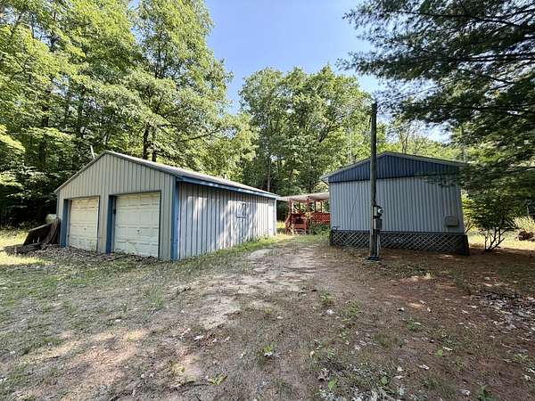 5.78 Acres of Land with Home for Sale in Brethren, Michigan