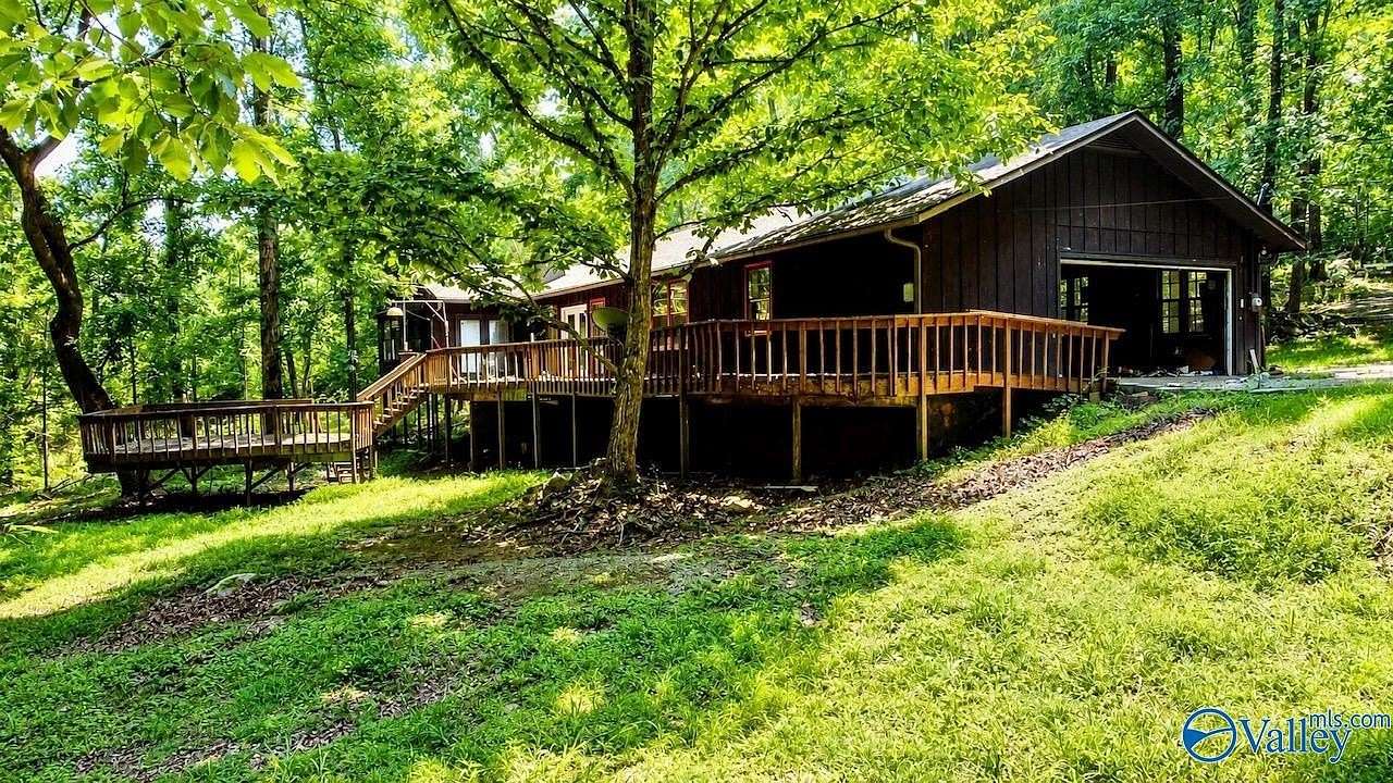 4.9 Acres of Land with Home for Sale in Laceys Spring, Alabama