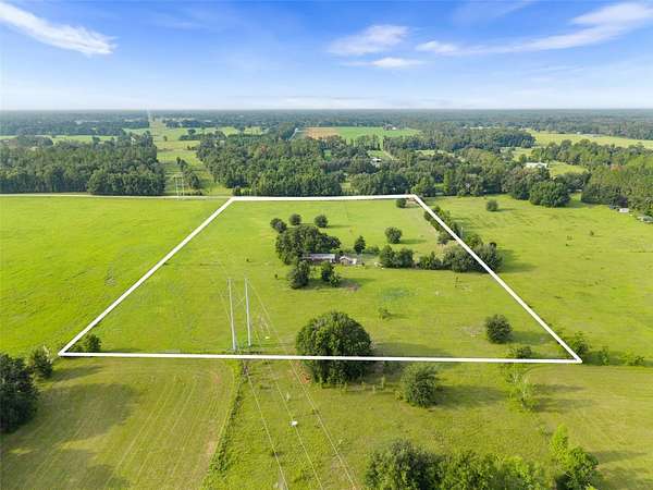 11 Acres of Land with Home for Sale in Trenton, Florida