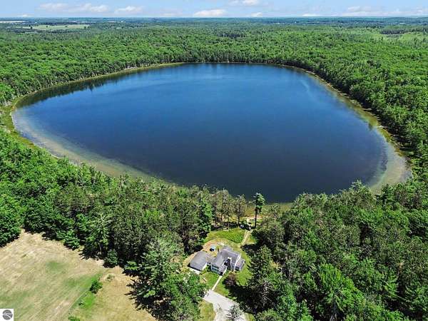 855 Acres of Land with Home for Sale in Lincoln, Michigan