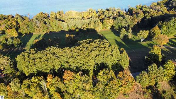 0.72 Acres of Residential Land for Sale in Kewadin, Michigan