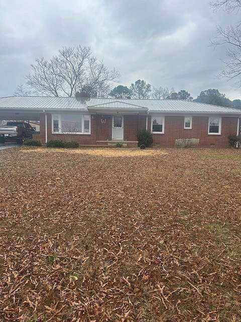 4.2 Acres of Land with Home for Sale in Camden, Tennessee