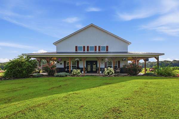 152 Acres of Recreational Land with Home for Sale in Fair Play, Missouri