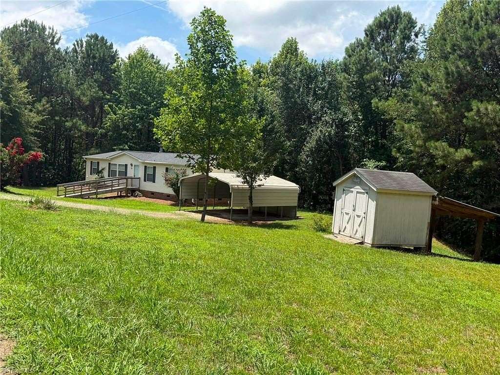 3 Acres of Land with Home for Sale in Madison, North Carolina