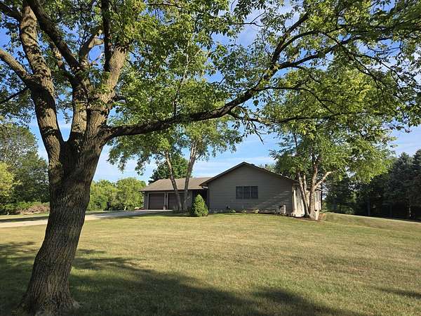 5.88 Acres of Land with Home for Sale in Harvard, Illinois